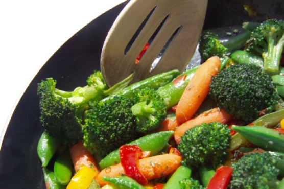 Healthy nutrition - vegetable stir-fry cooking in pan