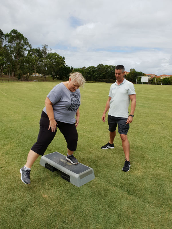 Gold Coast Personal Trainer encouraging client